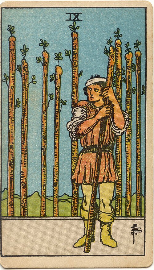 Nine of Wands, original 1909 Rider–Waite–Smith illustration by Pamela Colman Smith